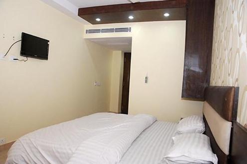 Crown Royale Hotel Dehradun Quarto foto