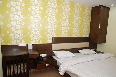 Crown Royale Hotel Dehradun Quarto foto